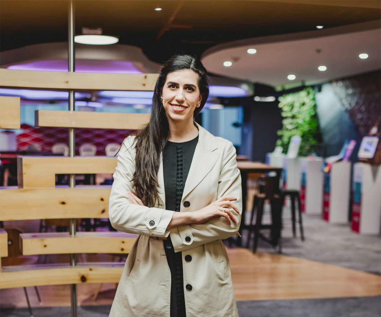 Woman with arms crossed, ready for business